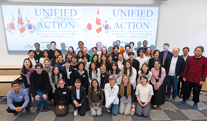 UNLABELED members participating in a student forum in Tokyo